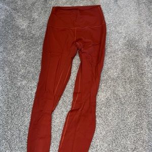 BURNT ORANGE LULULEMON LEGGINGS, SIZE 4, LIGHTLY WORN